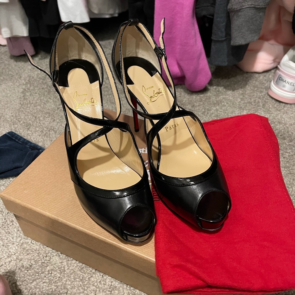 Christian Louboutin black pumps